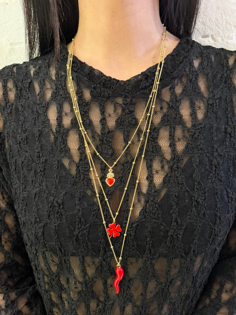 collana tre fili cuore sacro ,quadrifoglio e cornetto