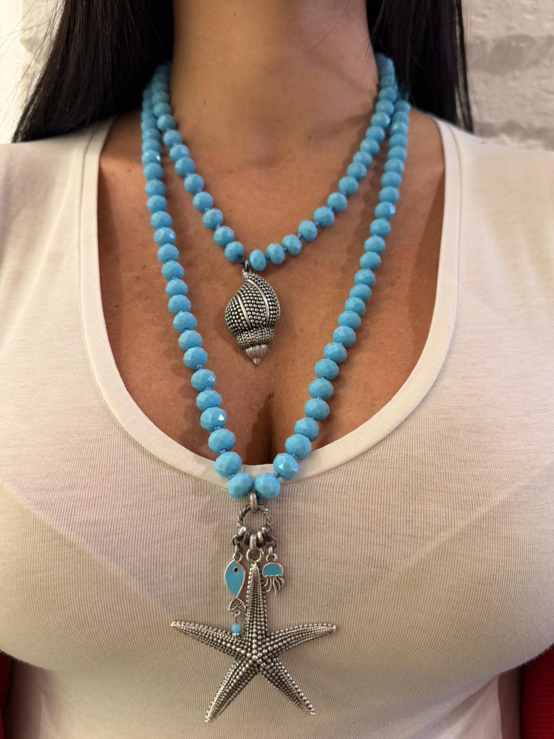 Collana Lunga in cristallo turchese con pendenti marini